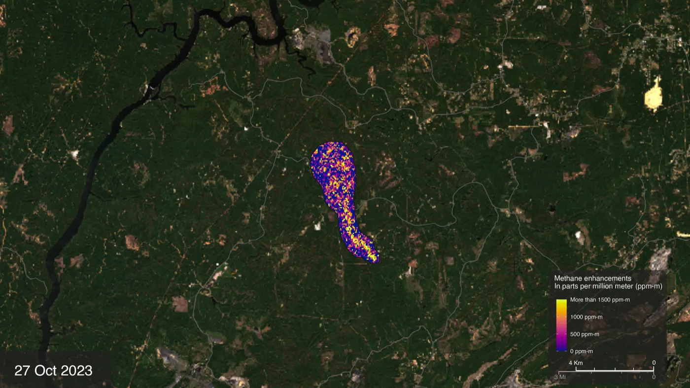 Satellite view of green forest with a winding river; a long purple, orange and yellow plume shows methane drifting from a single point, with a colour scale in parts per million metre.